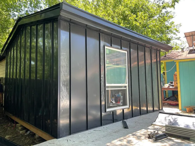 Black standing seam metal wall panels for Metal Roof Installation in Somerville